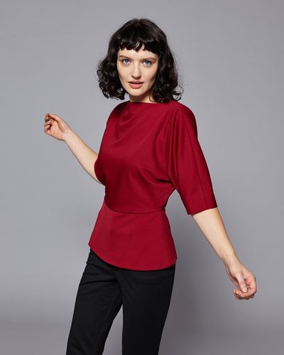 Lennon Courtney at Dunnes Stores Burgundy Batwing Top thumbnail
