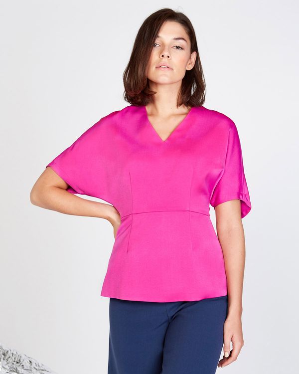 Lennon Courtney at Dunnes Stores Berry Batwing Top